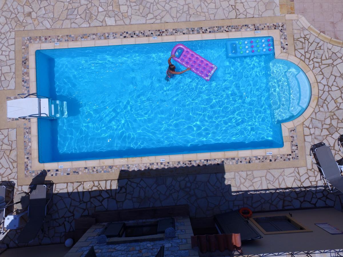 Finikes Apartments Stoupa Bagian luar foto