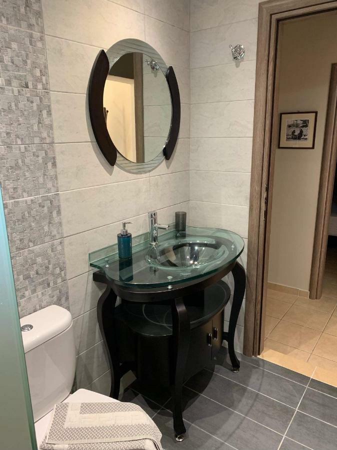 Finikes Apartments Stoupa Bagian luar foto